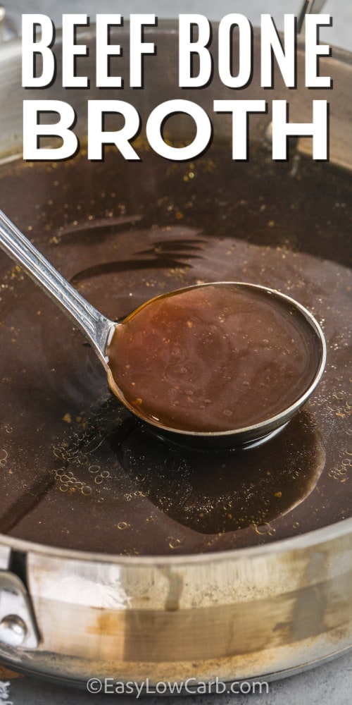 a silver ladle scooping some beef bone broth out of a shallow pan, with a title