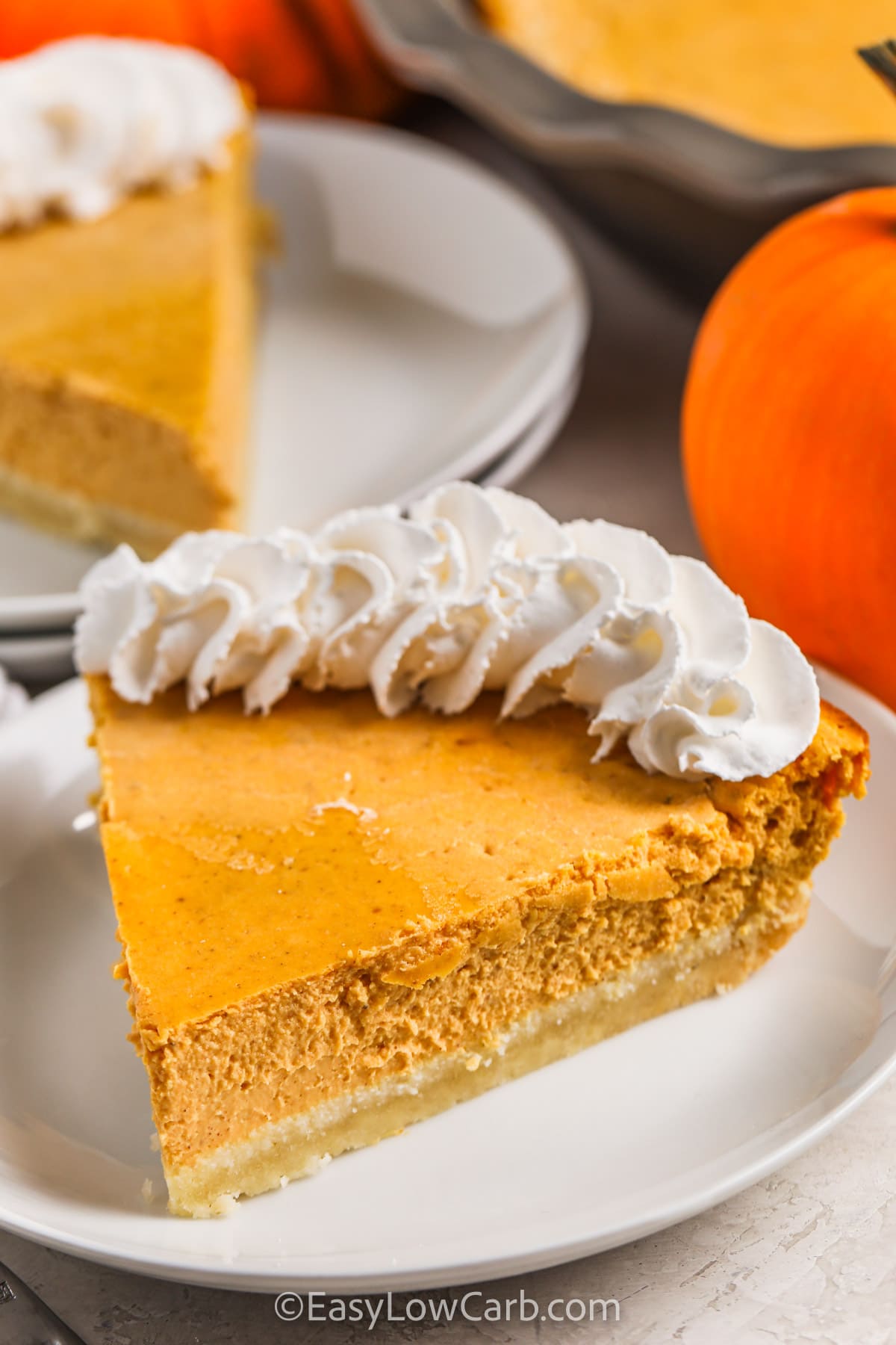 Keto Pumpkin Cheesecake with whipped cream