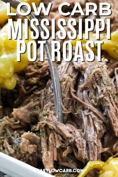 Slow Cooker Mississippi Pot Roast with pepperoncinis on top, pulled apart with a fork, with a title