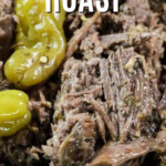 Slow Cooker Mississippi Pot Roast in a pan with pepperoncinis on top, with a title