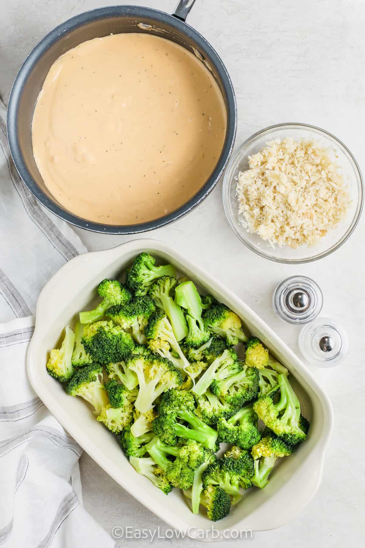 sauce , broccoli and toppings in dishes to make Broccoli au Gratin
