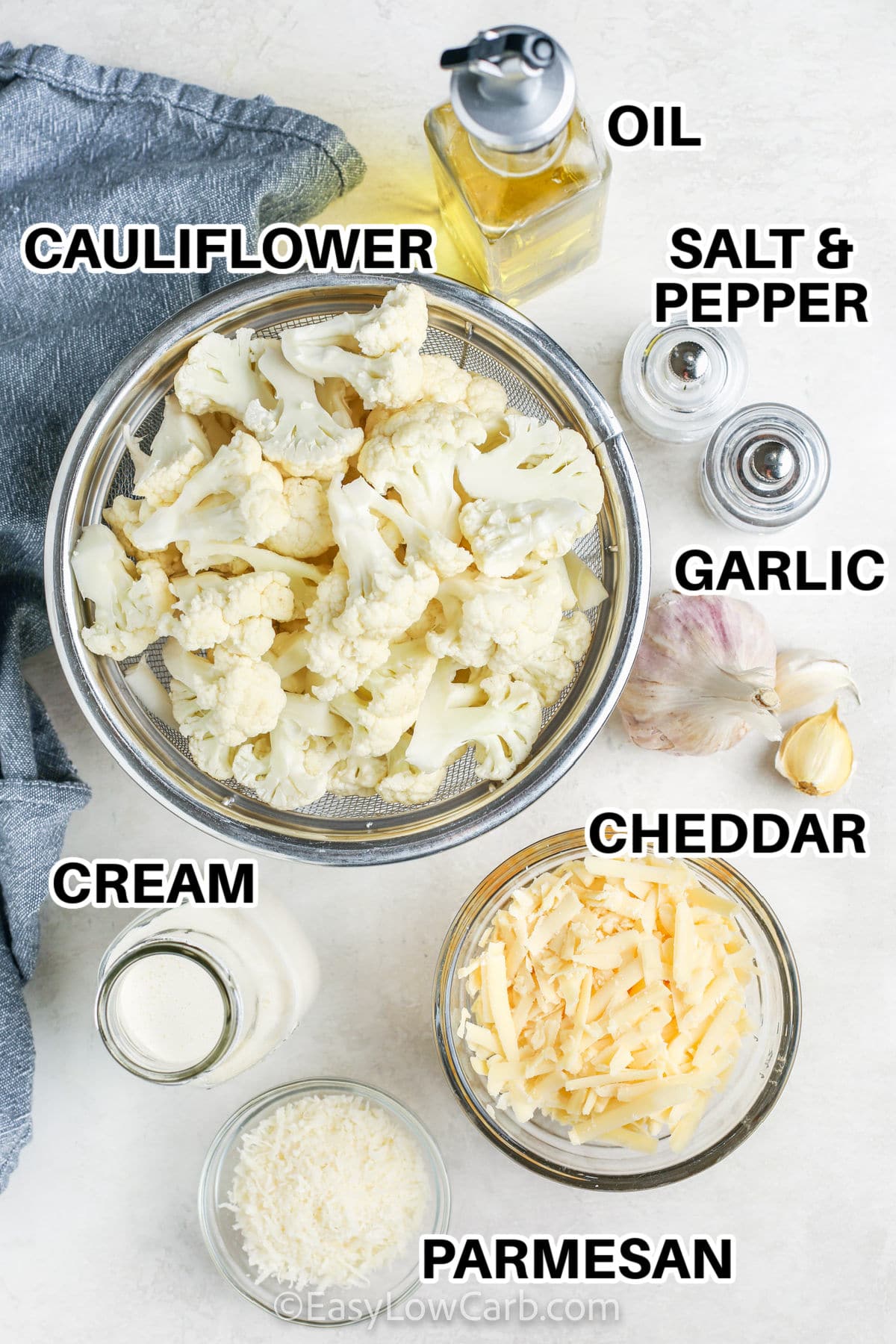 cauliflower , oil , garlic , cheddar , parmesan , cream with labels to make Cauliflower au Gratin