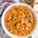 Keto Butter Chicken in a bowl with a bowl of rice