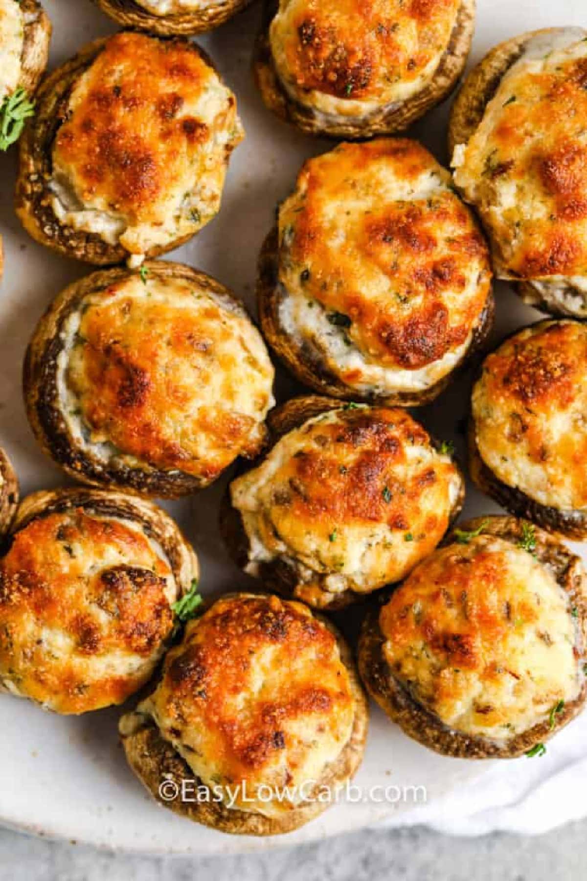 air fryer stuffed mushrooms served on a white plate