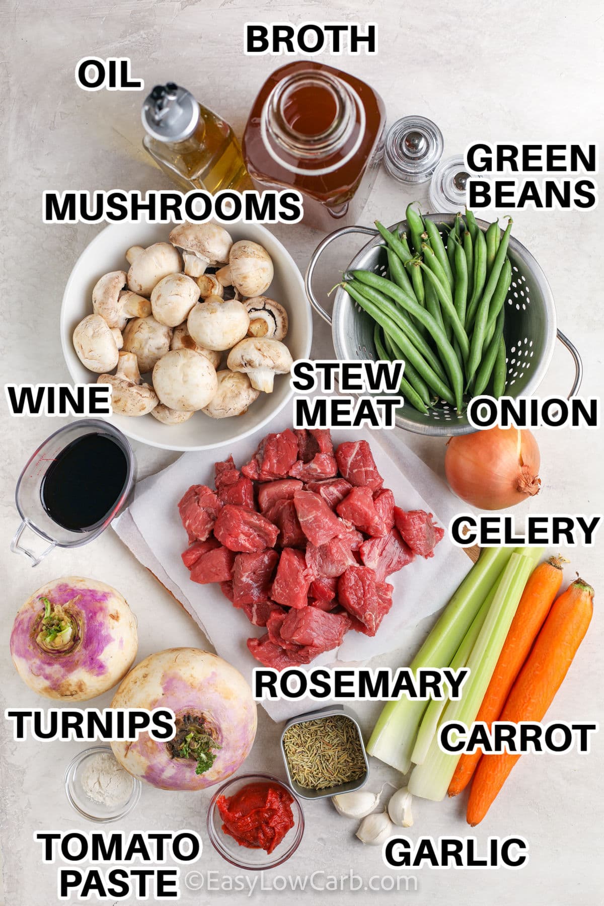 broth , oil , green beans , mushrooms , wine , stew meat , onion , celery , rosemary , carrot , garlic , turmpis and tomato paste with labels to make Low Carb Beef Steak Stew
