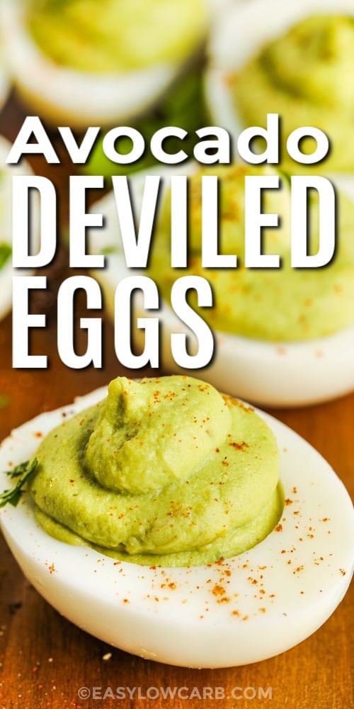 Avocado Deviled Eggs with seasonings and writing