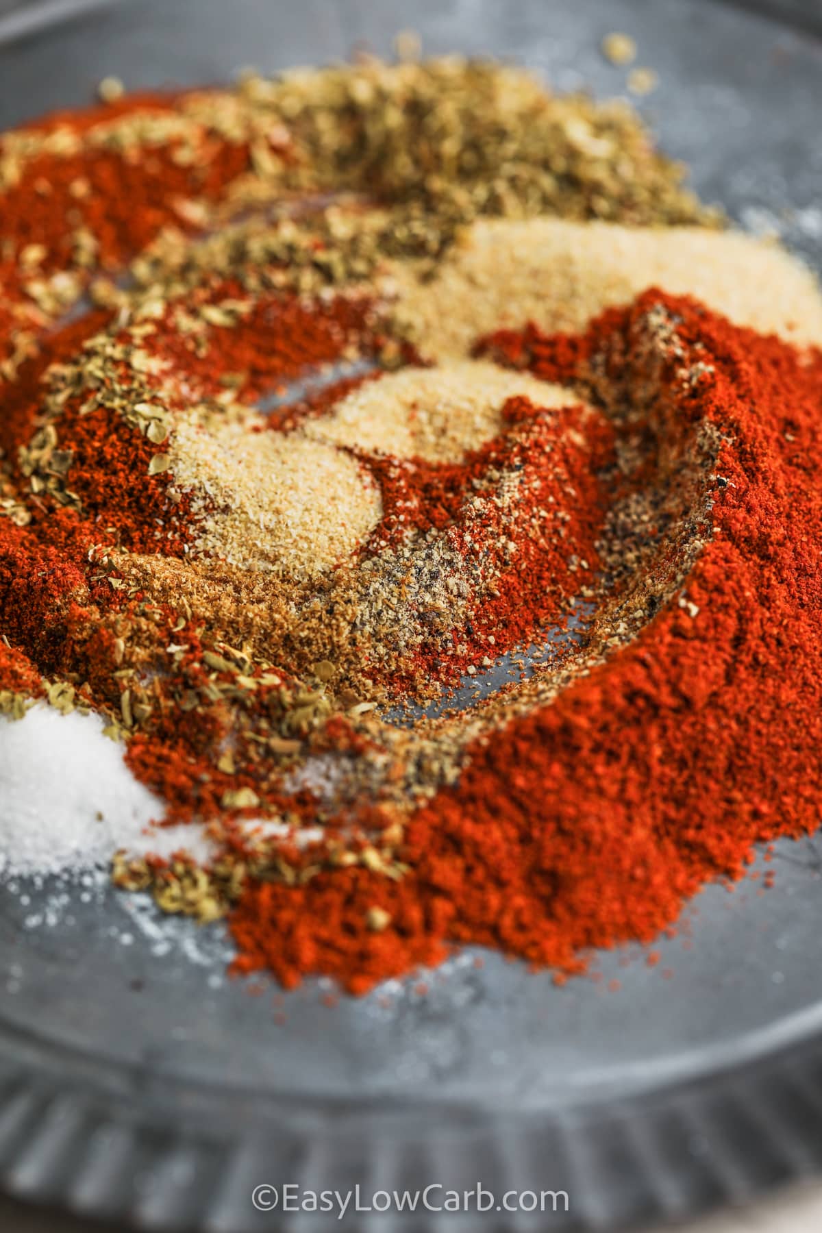 mixing spices to make Southwest Seasoning