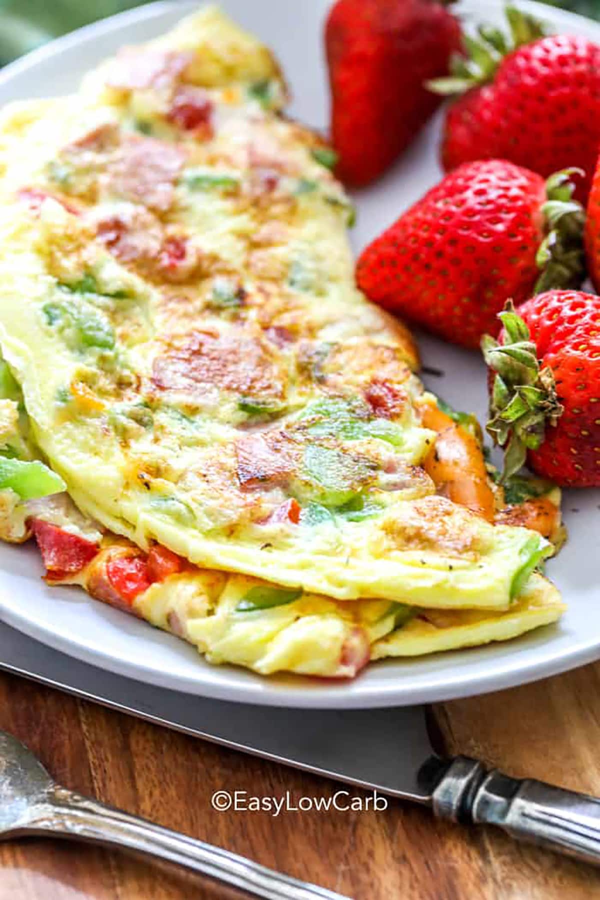 plated Denver Omelet with strawberries