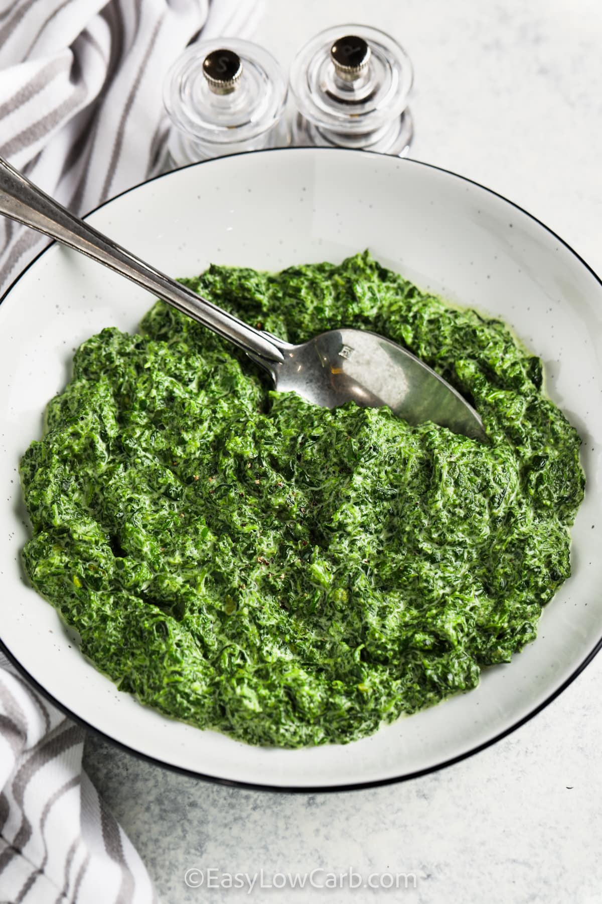 Easy Creamed Spinach with a spoon