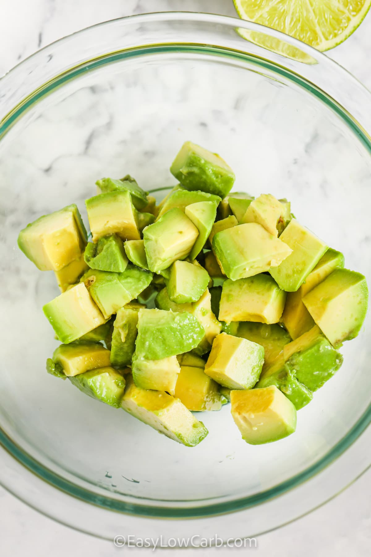 avocado in a bowl to make Avocado Salsa Recipe