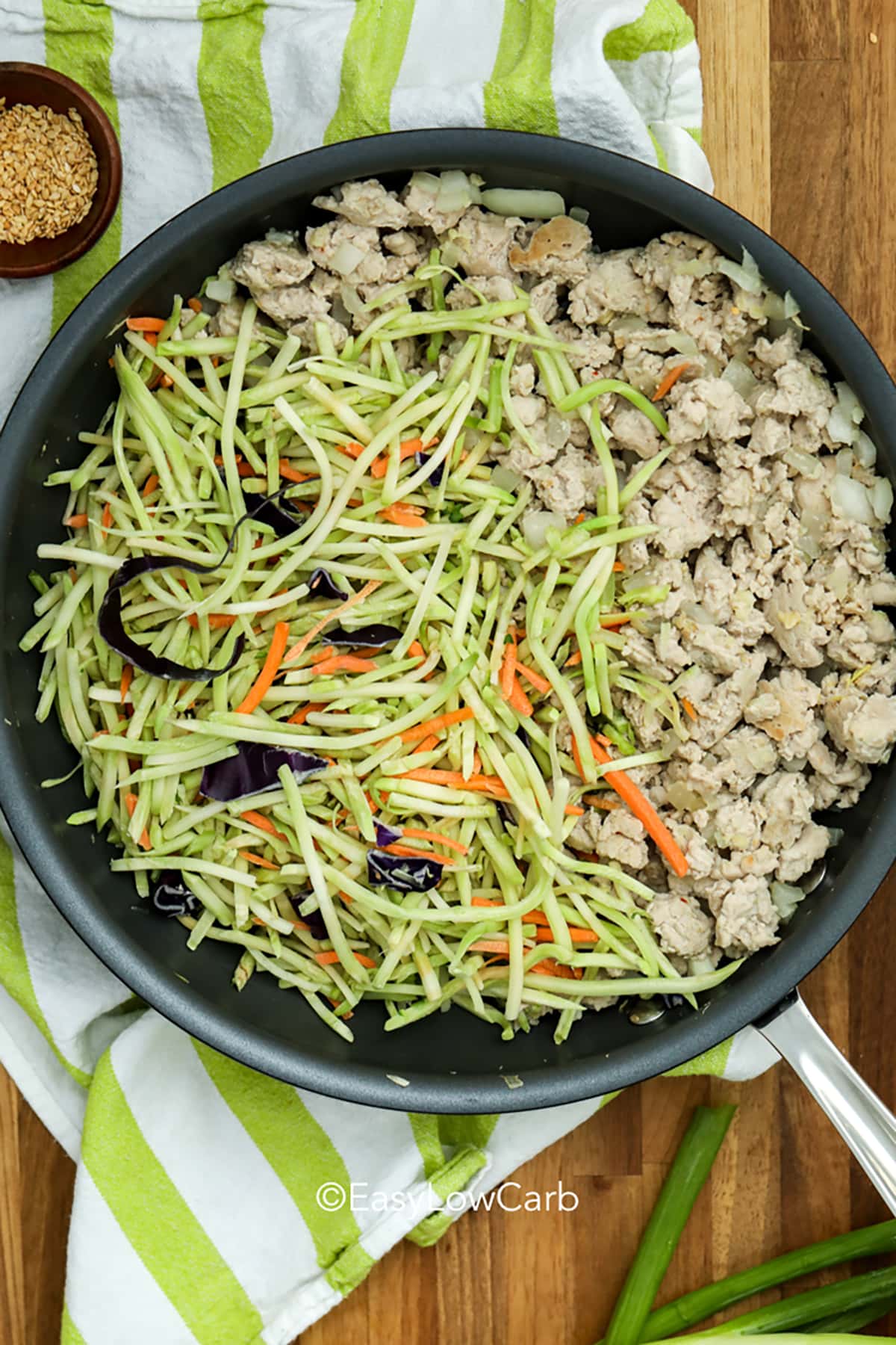 adding vegetables to pan to make Egg Roll Bowl Recipe filling