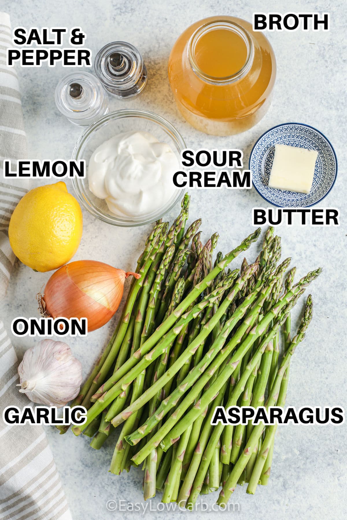 broth , lemon , sour cream, butter , onion , garlic , asparagus , salt and pepper with labels to make Creamy Asparagus Soup