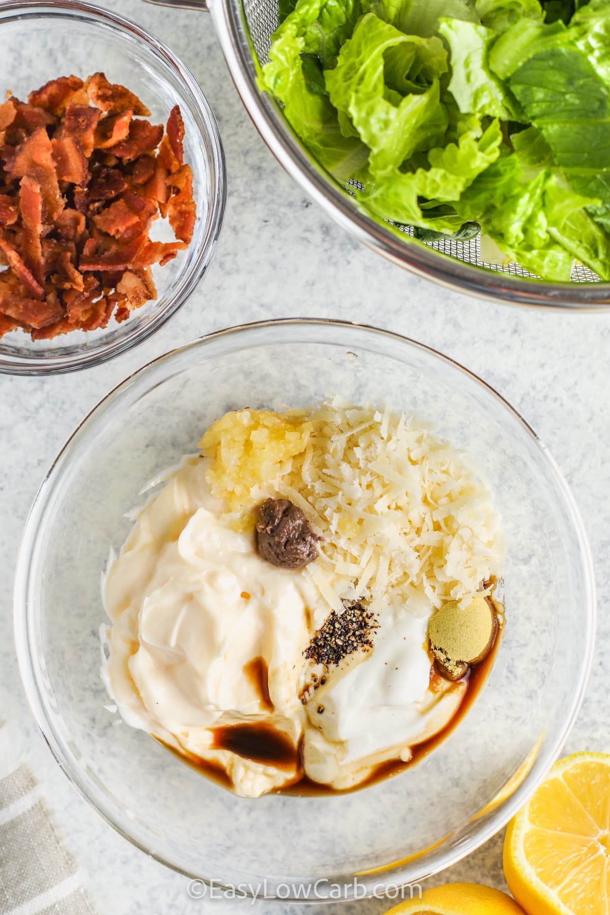 adding ingredients together to make dressing for Low Carb Caesar Salad Recipe