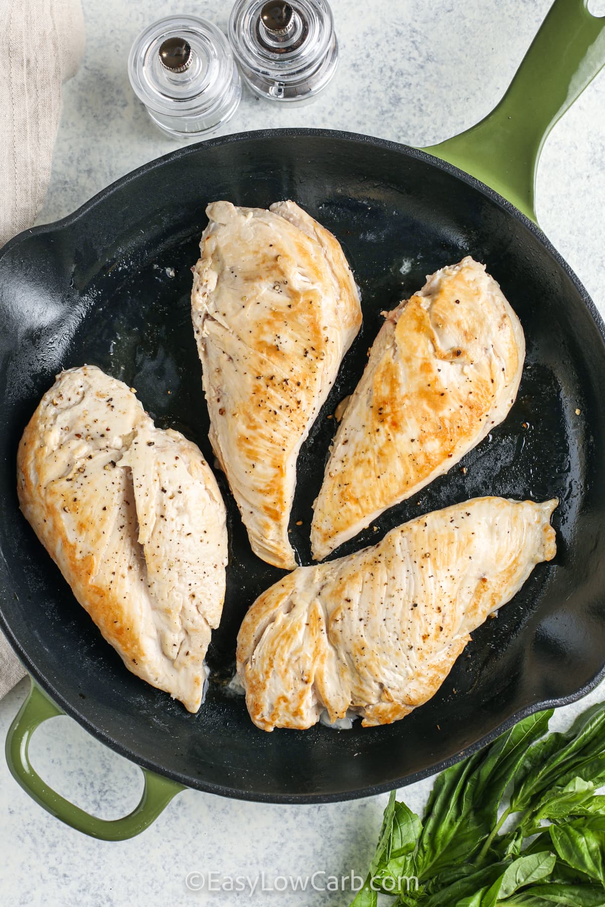 cooking chicken to make Caprese Chicken Recipe
