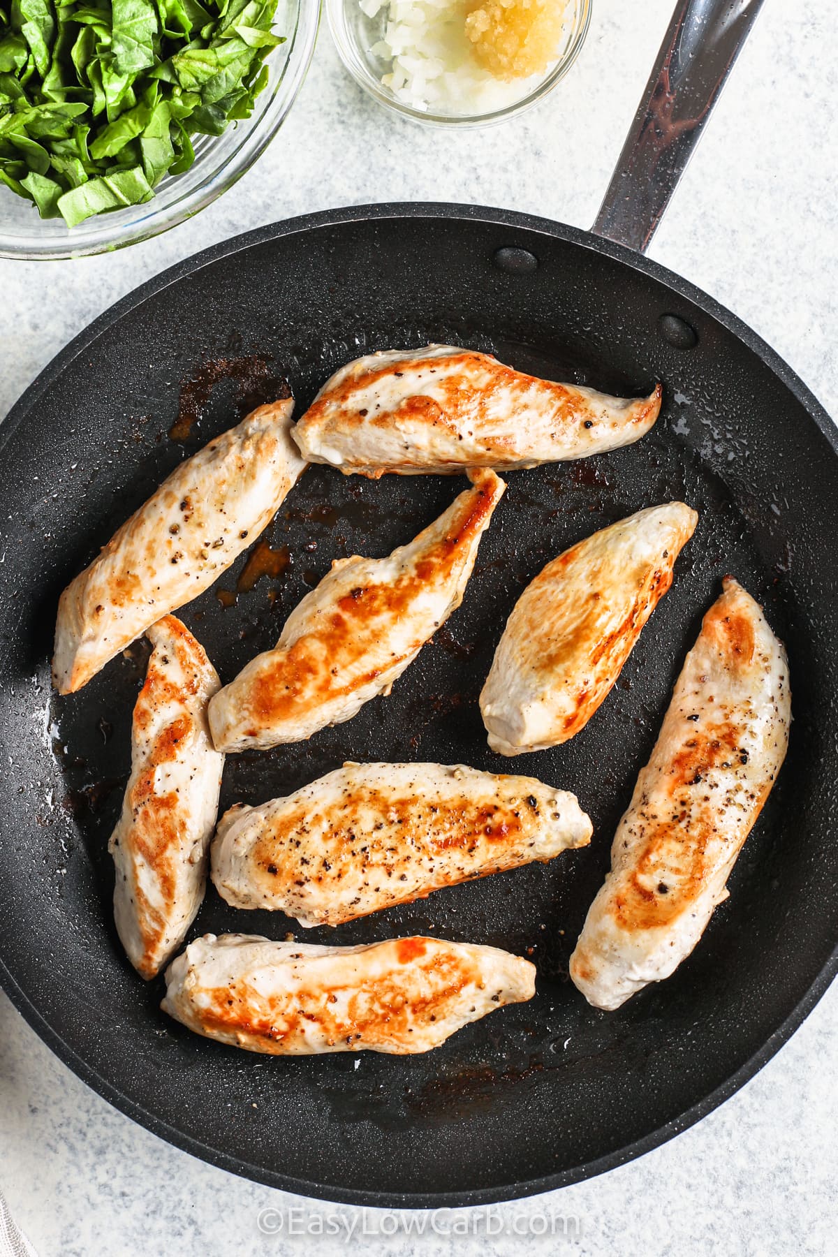 cooking chicken to make Creamy Spinach Chicken