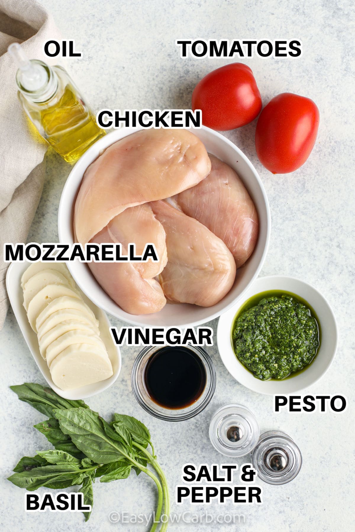 tomatoes , chicken , oil , mozzarella , vinegar , pesto , basil and salt and pepper with labels to make Caprese Chicken Recipe