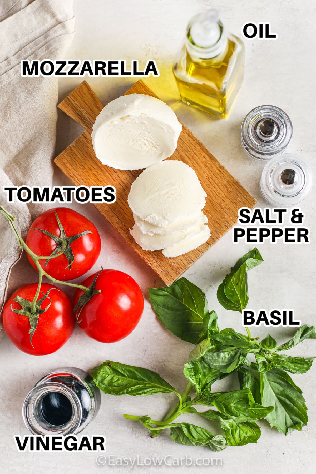 mozzarella , oil , basil , tomatoes , vinegar with labels to make Caprese Salad Recipe