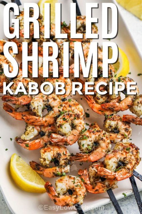 Grilled Shrimp Kabob Recipe on a plate with lemon slices and writing