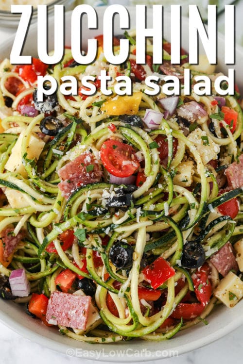 Zucchini Pasta Salad in a bowl with a title