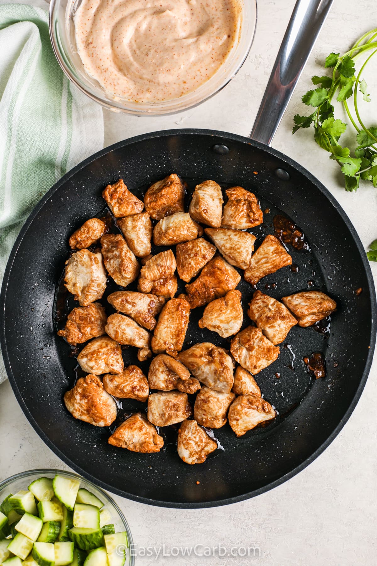 cooking chicken to make a Yum Yum Bowl