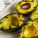 grilled avocado on a plate