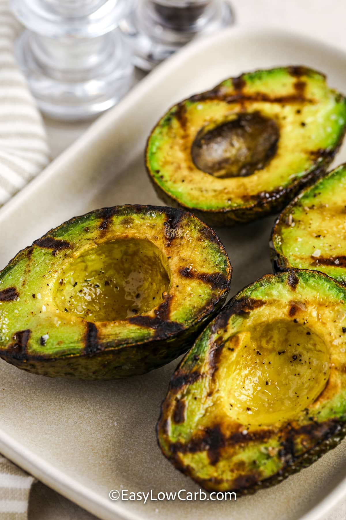 grilled avocado on a plate