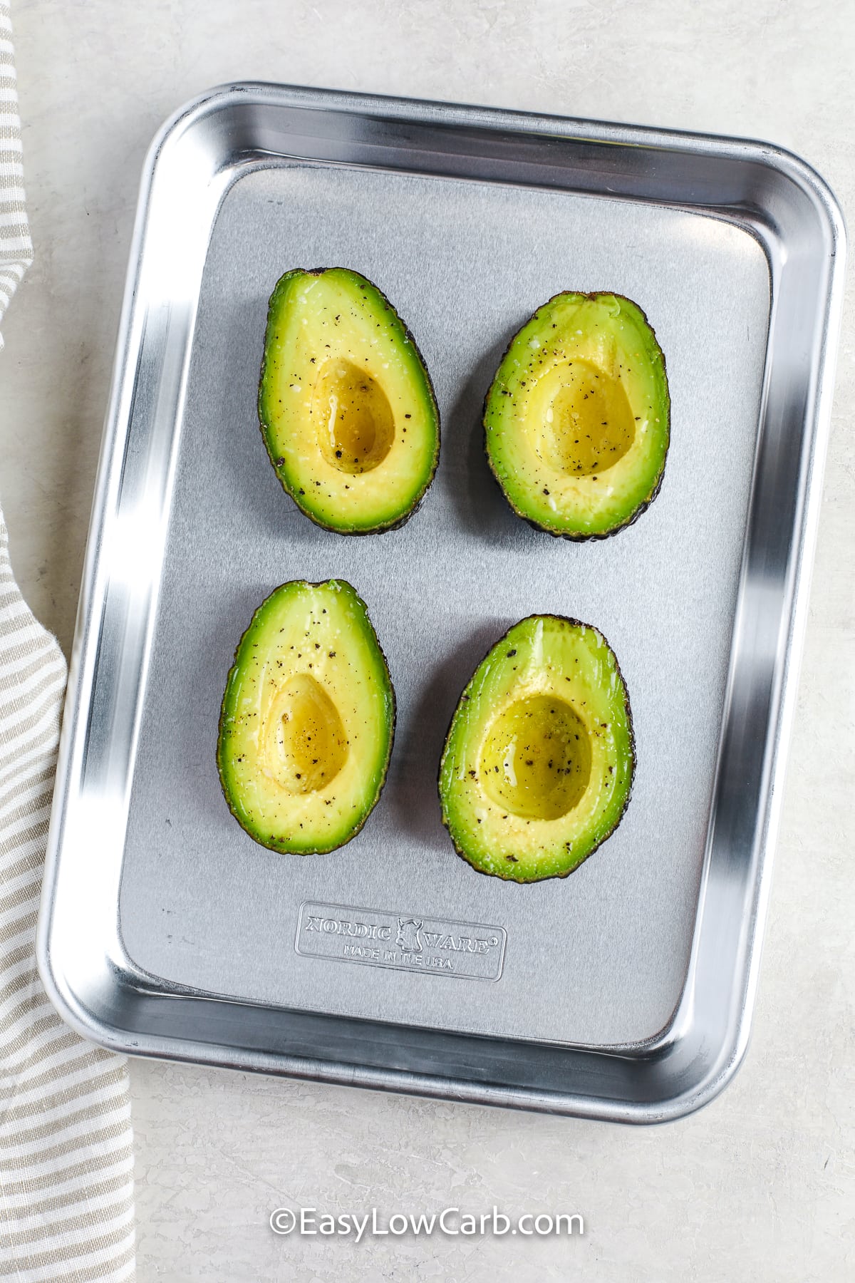 sliced avocados on a cooking tray
