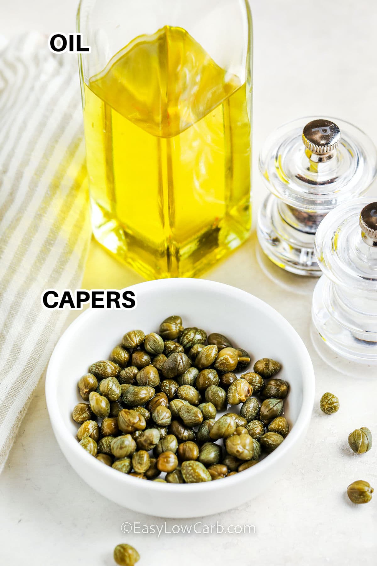 oil and capers with labels to make Fried Capers