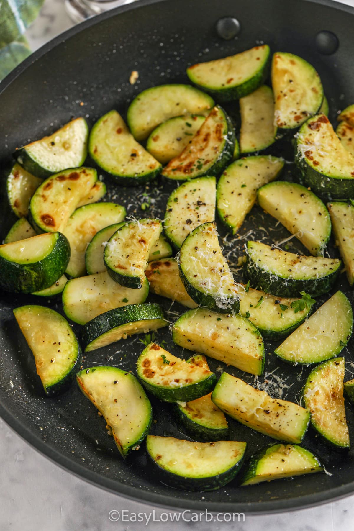 cooking Sauteed Zucchini in a pan