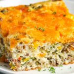 Sausage Egg Casserole on a plate with a title
