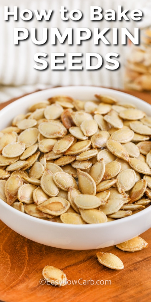 baked pumpkin seeds in a bowl with a title