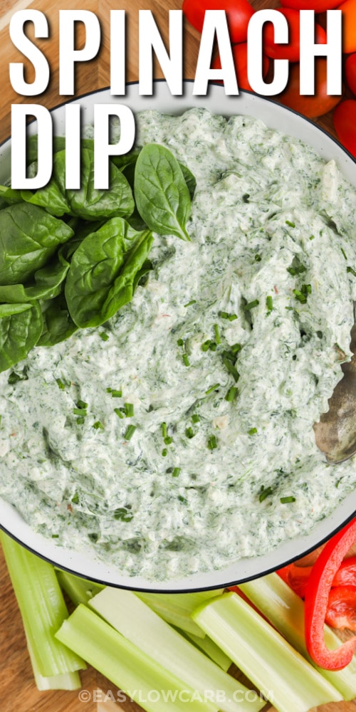 bowl of spinach dip with writing