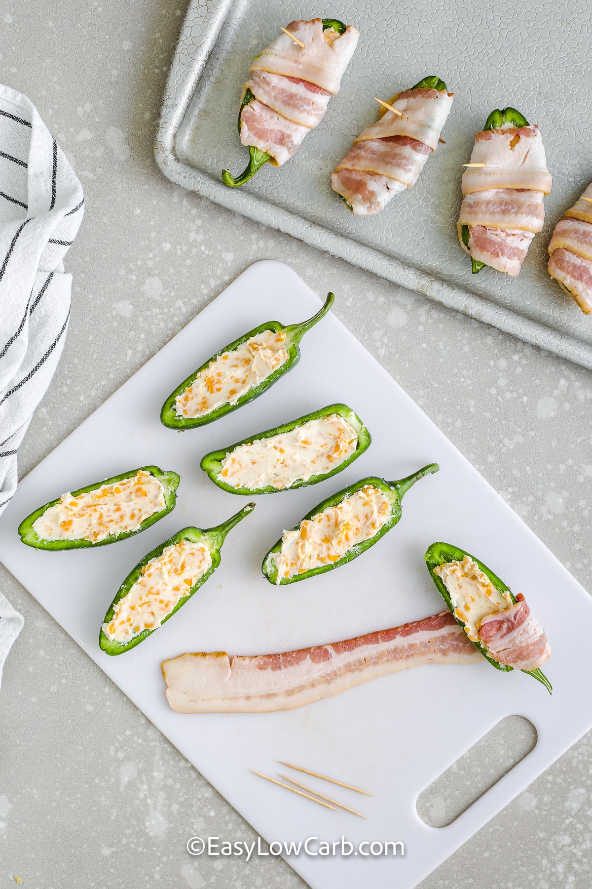 process of wrapping and stuffing bacon wrapped jalapenos
