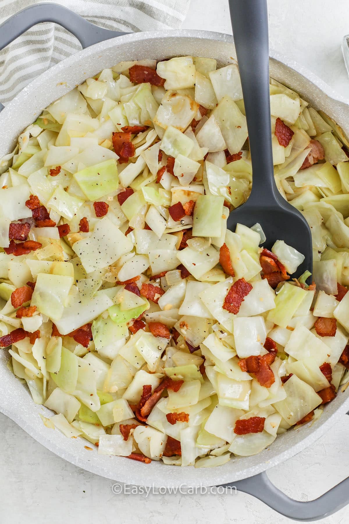 adding bacon to cabbage to make Fried Cabbage with Bacon