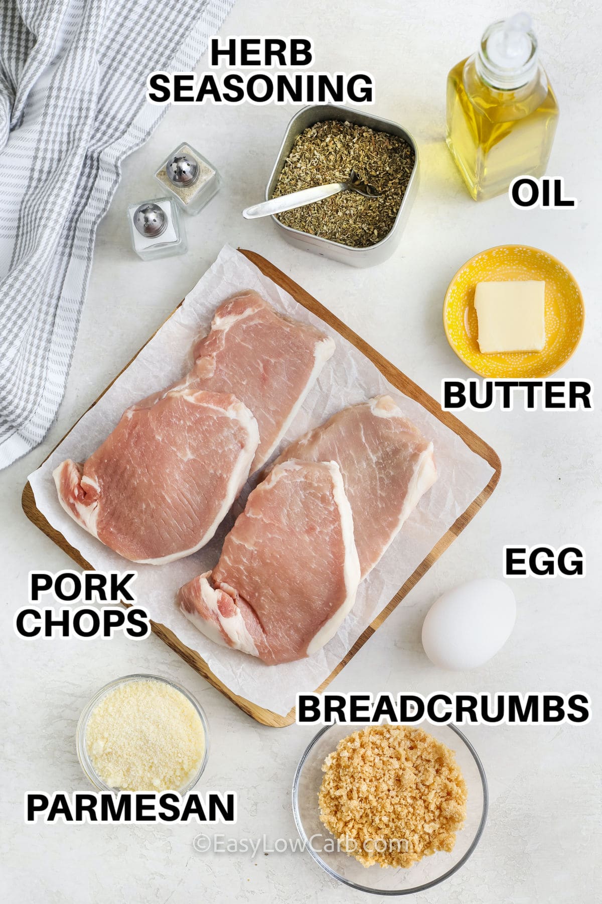 herb seasoning , oil, butter , egg , breadcrumbs , pork chops , parmesan with labels to make Keto Pork Chops
