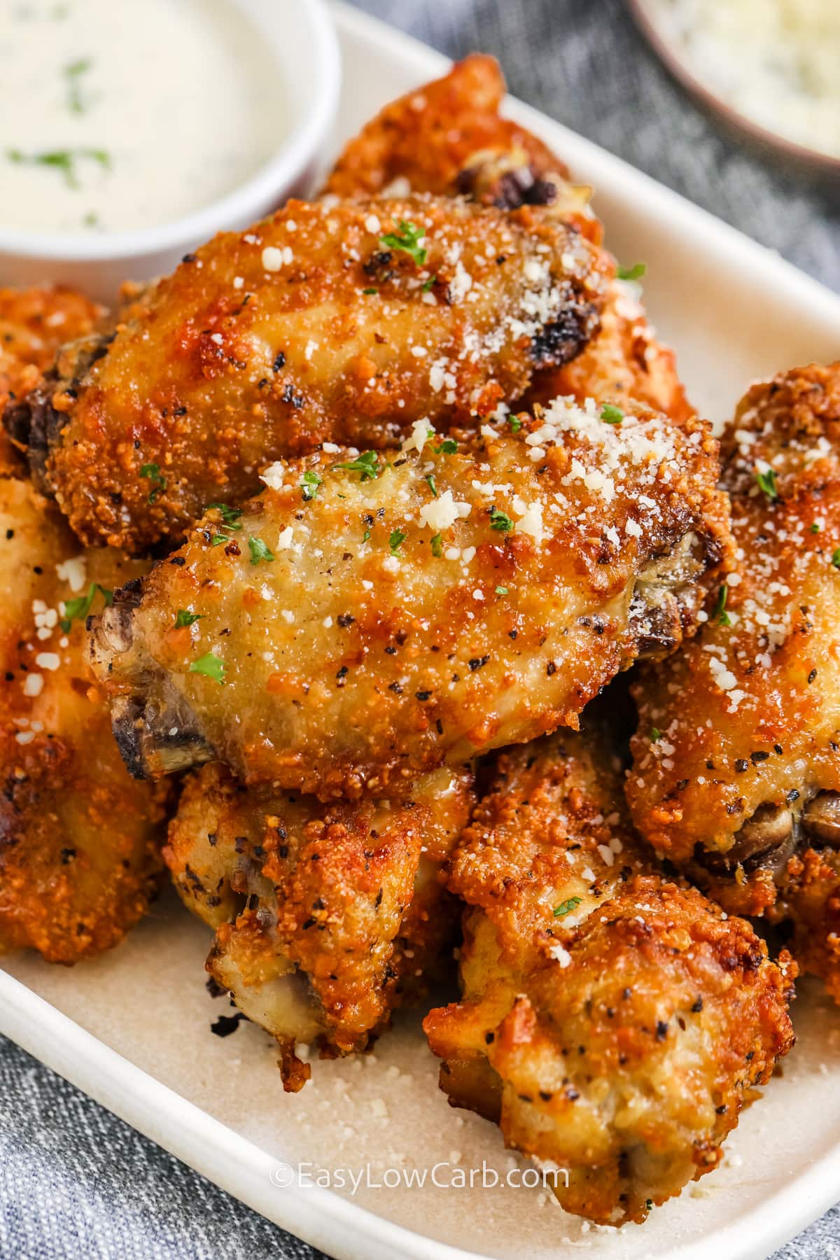 plated parmesan Keto Chicken Wings