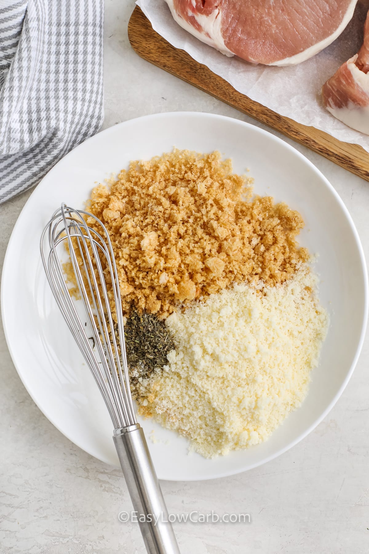 ingredients in a bowl to make keto breadcrumbs for Keto Pork Chops