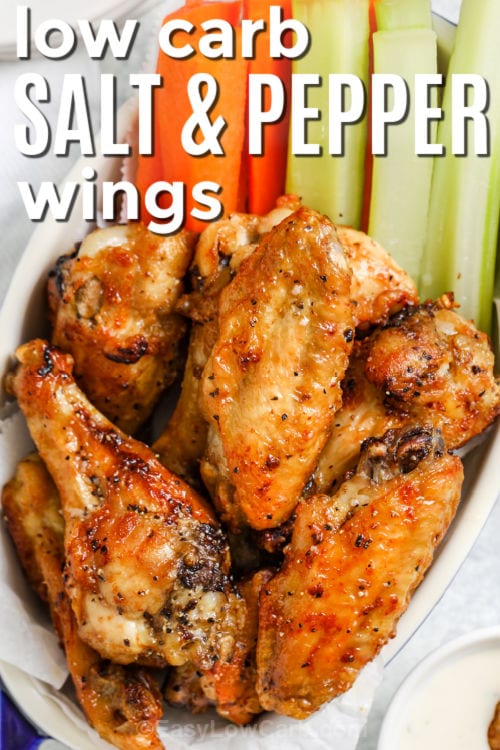 Salt and Pepper Chicken Wings with carrots and celery and a title