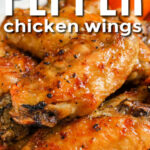 close up of cooked Salt and Pepper Chicken Wings with writing