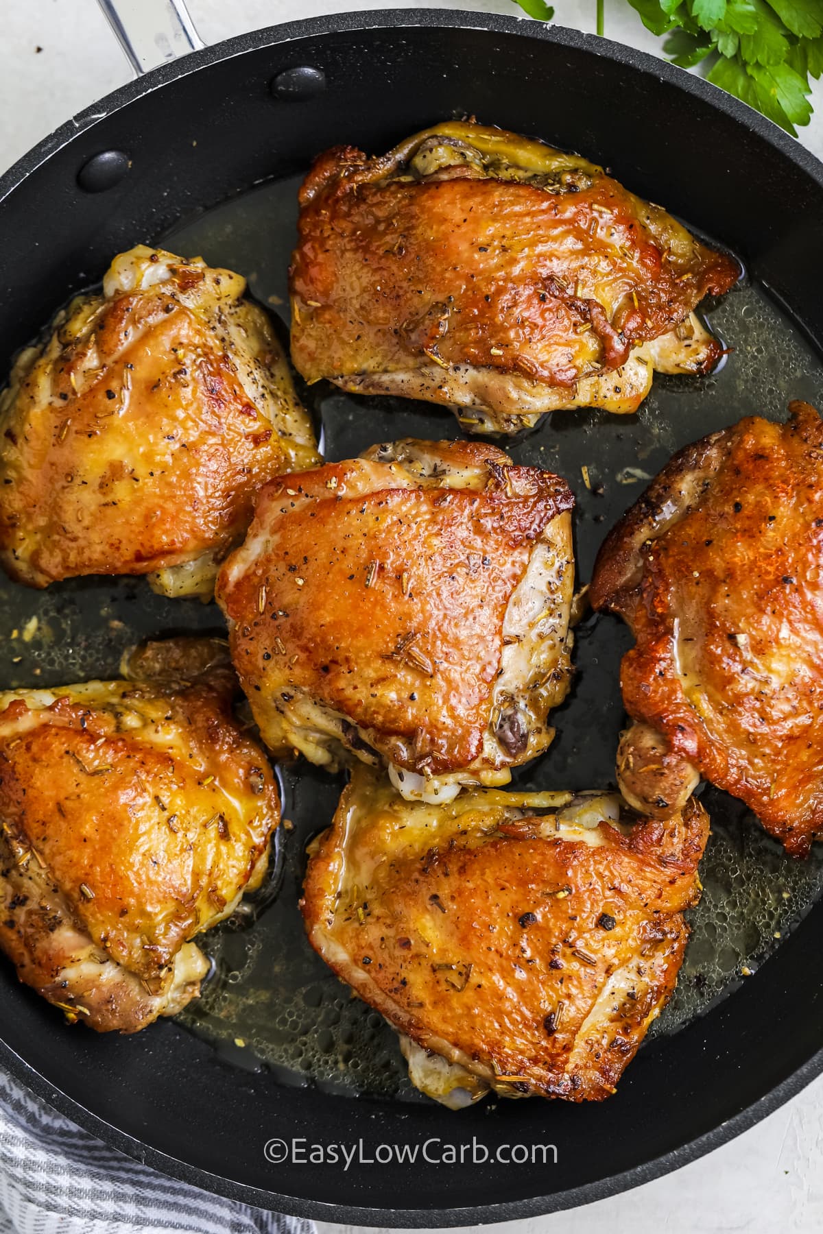 cooked Skillet Chicken Thighs in the pan