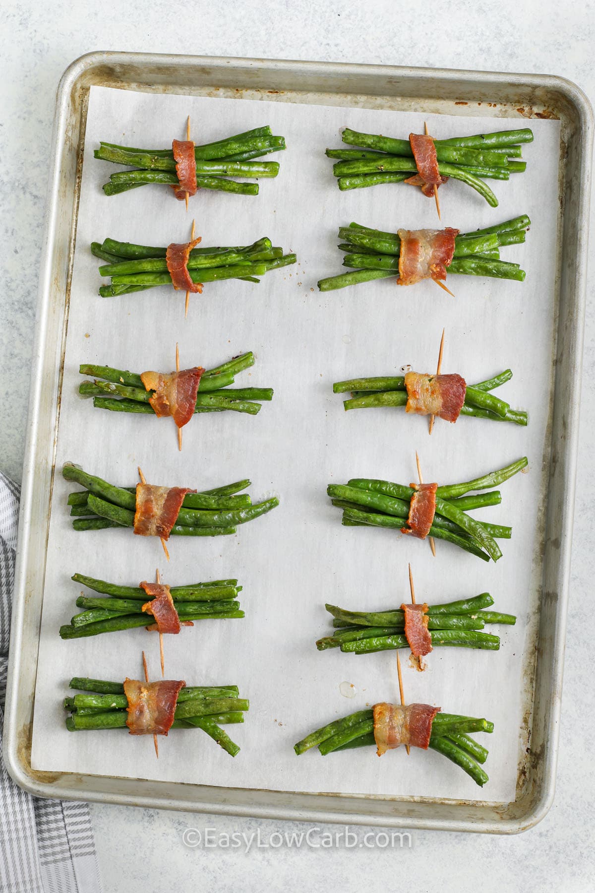 Bacon Wrapped Green Beans cooked on a sheet pan