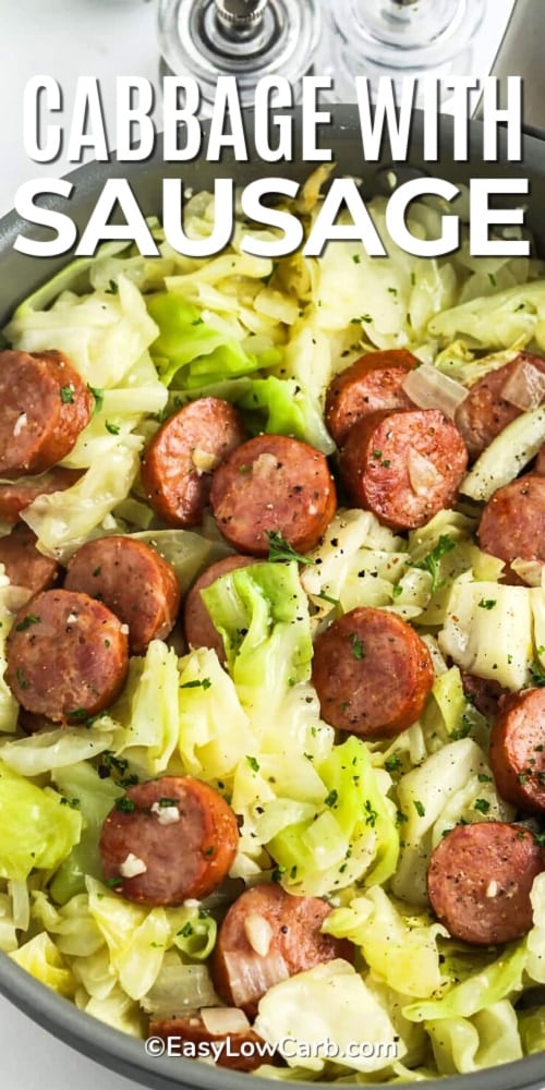 Fried cabbage and sausage in a skillet with text