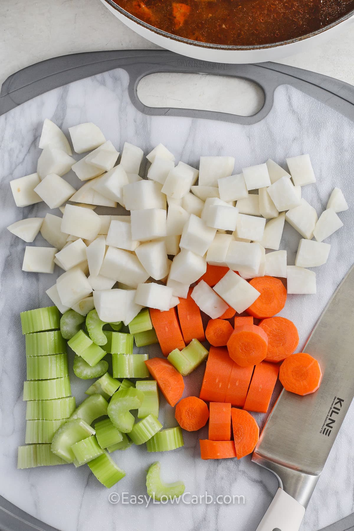 chopping vegetables to make Beef and Vegetable Soup