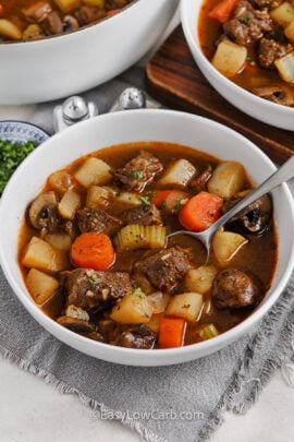 Beef and Vegetable Soup in a bowl with a spoon