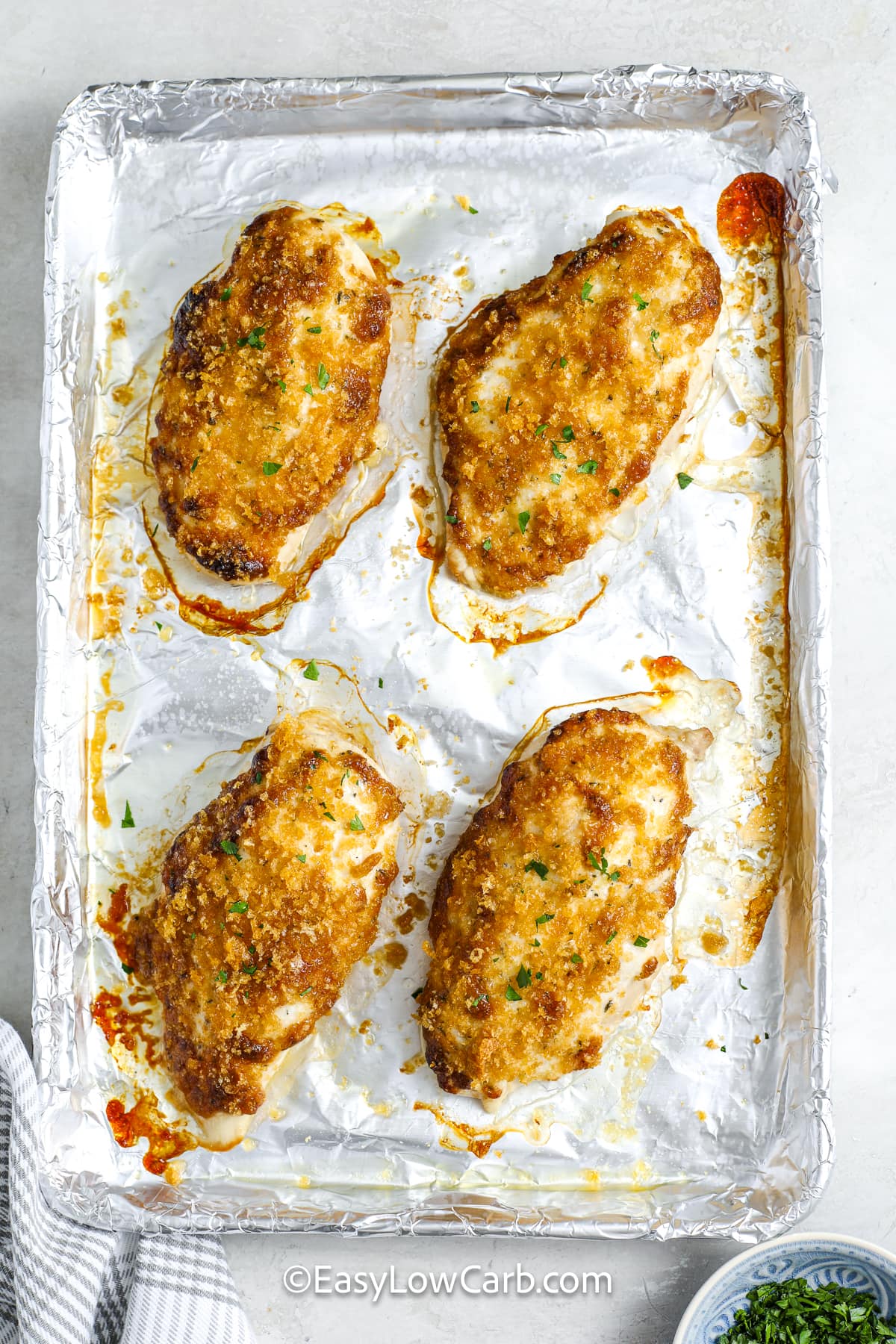 Baked Parmesan Chicken on a baking sheet
