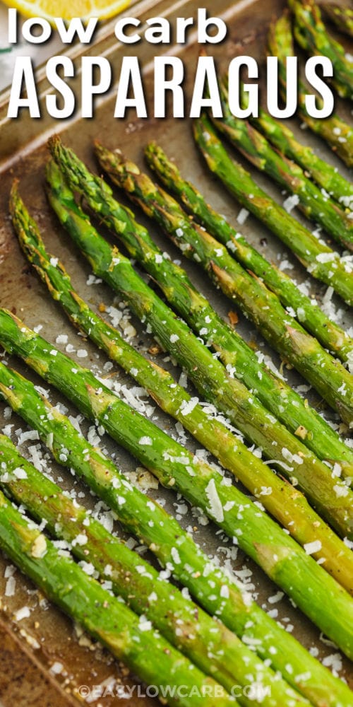 cooked Oven Roasted Asparagus Recipe on a sheet pan with writing