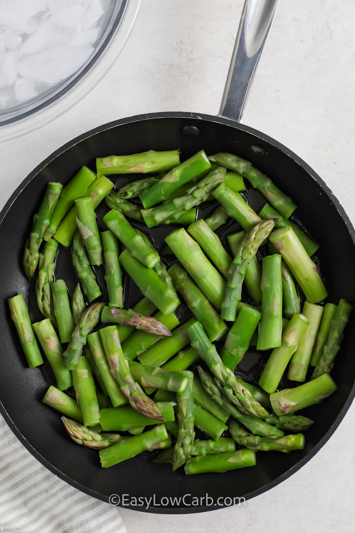 Chopped Asparagus in a frying pan