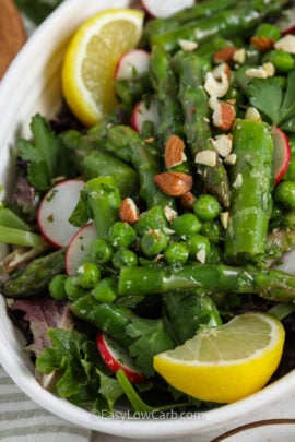 An asparagus salad in a serving dish