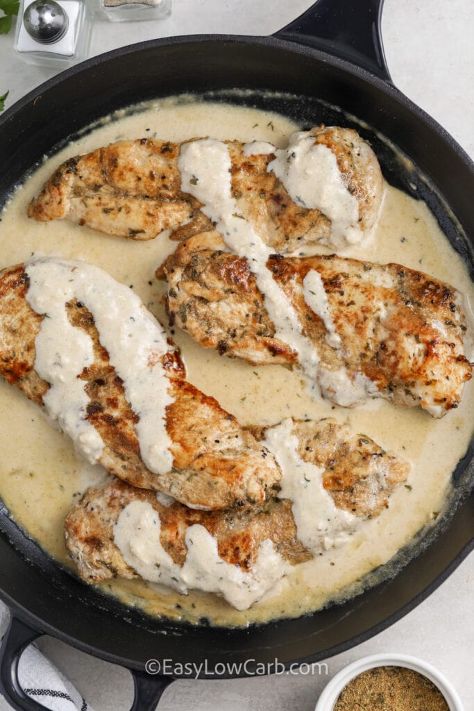 creamy cajun chicken in a skillet