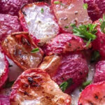 Roasted radishes recipe on a baking sheet with a title